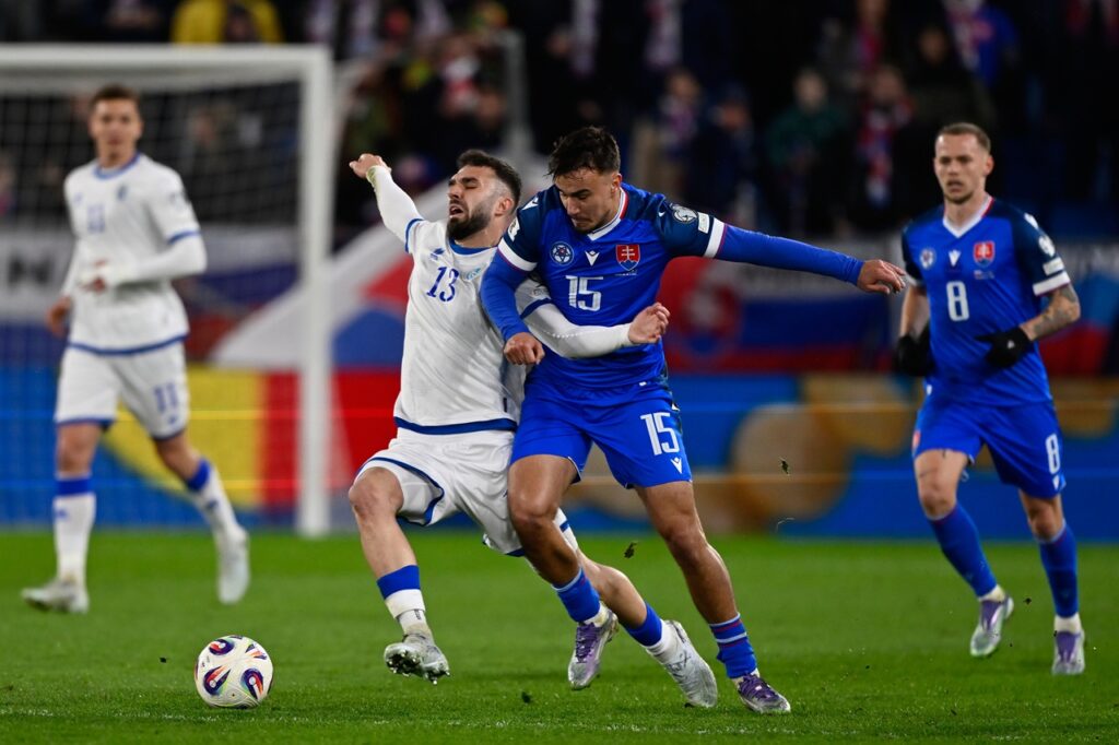 Kreshnik Hajrizi of Kosovo, left, and David Strelec